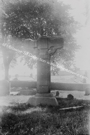 SEE ALSO VII.61. : UNFINISHED CROSS IN GRAVEYARD